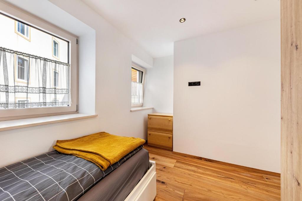 Postel nebo postele na pokoji v ubytování J N Appartement Spritzenhaus