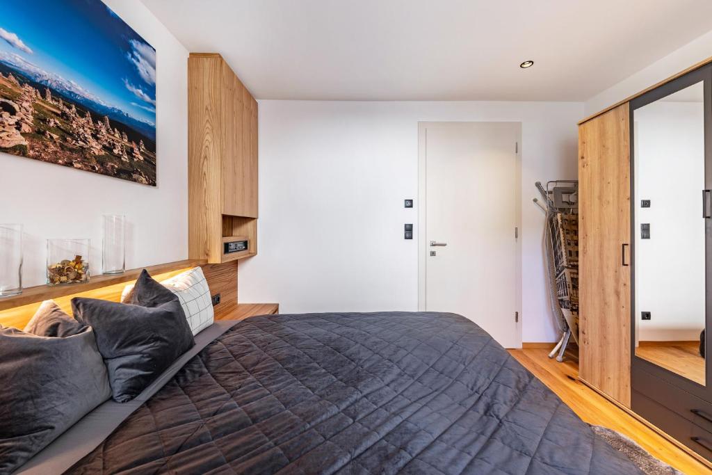 Postel nebo postele na pokoji v ubytování J N Appartement Spritzenhaus