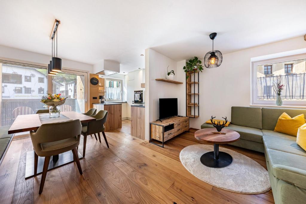 Posezení v ubytování J N Appartement Spritzenhaus