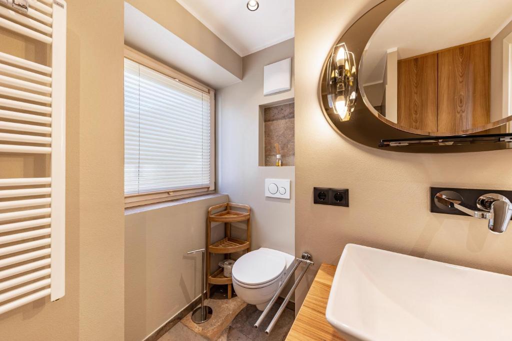 Koupelna v ubytování J N Appartement Spritzenhaus