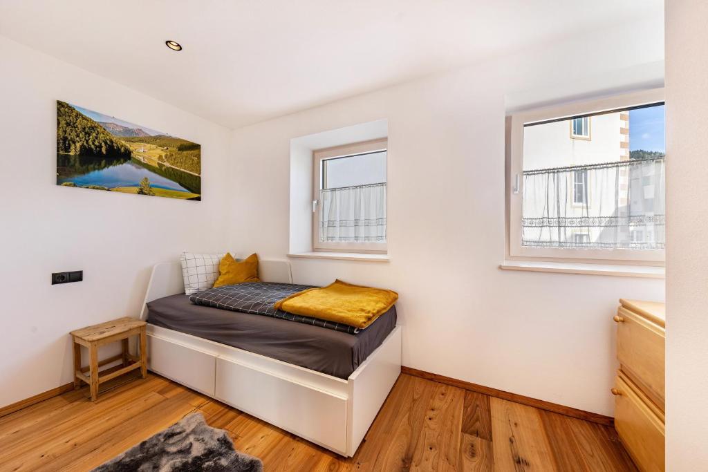 Postel nebo postele na pokoji v ubytování J N Appartement Spritzenhaus