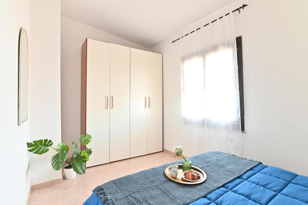 Postel nebo postele na pokoji v ubytování IzzHome Escape 1