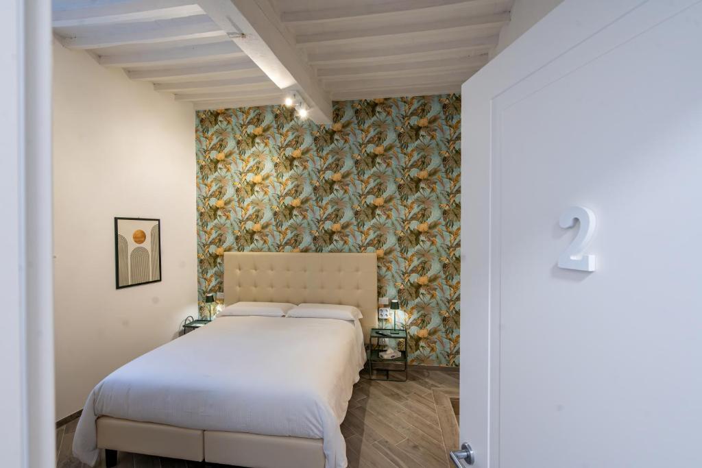 Postel nebo postele na pokoji v ubytování B&B Via Corsica 10