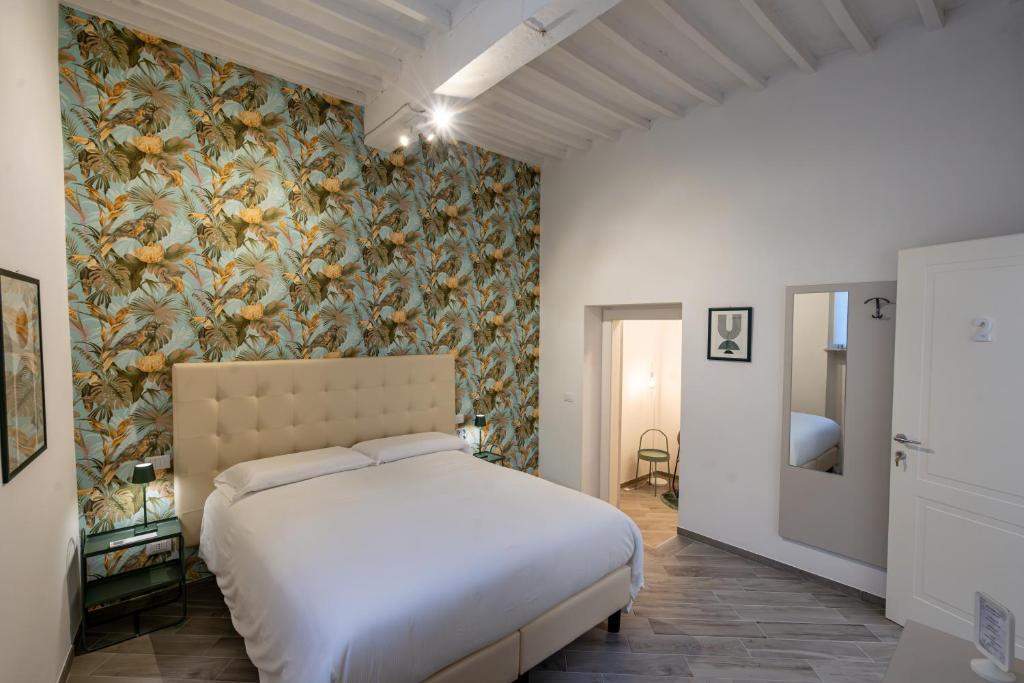 Postel nebo postele na pokoji v ubytování B&B Via Corsica 10