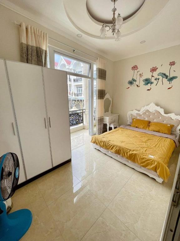 Postel nebo postele na pokoji v ubytování Villa Đà Lạt GD - Biệt Thự Đà Lạt GD Gần Hồ Xuân Hương Gần Chợ