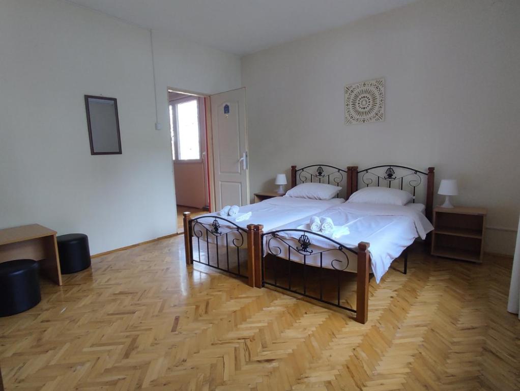 Postel nebo postele na pokoji v ubytování Apartmani Bon Bons