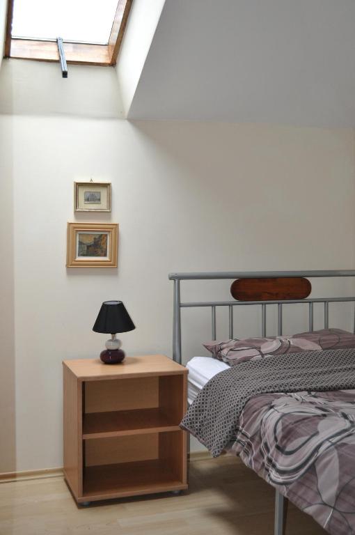 Postel nebo postele na pokoji v ubytování Apartmani Bon Bons