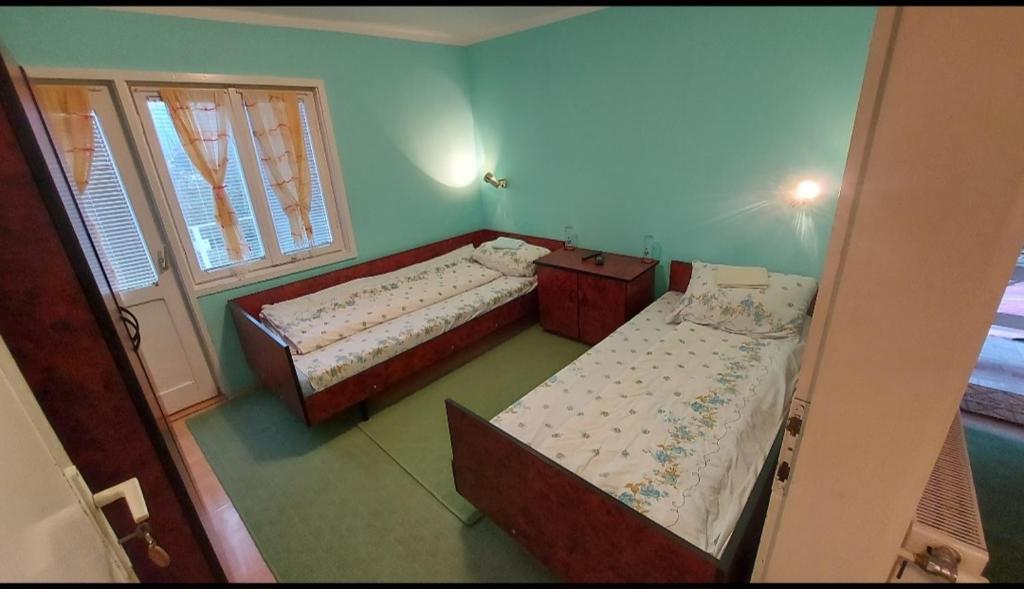 Letto o letti in una camera di Domaćinstvo Jolović