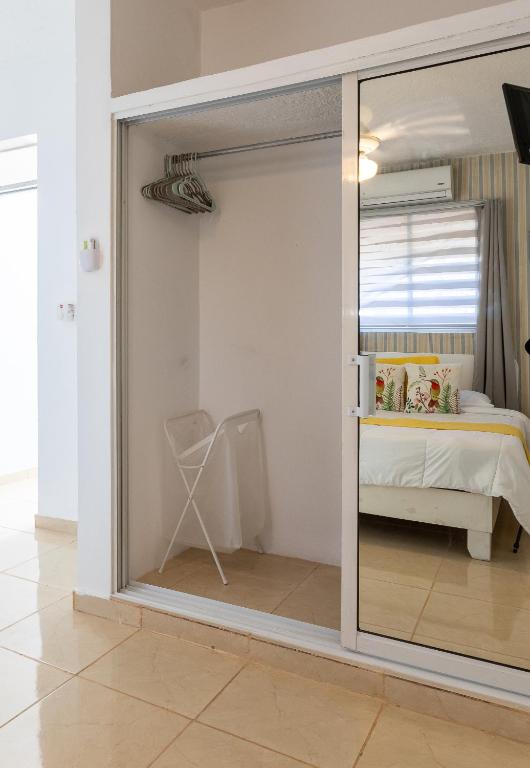 Postel nebo postele na pokoji v ubytování EDMA APARTAHOTEL