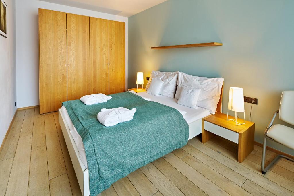Postel nebo postele na pokoji v ubytování Apartmán Krásná Lípa č. 1