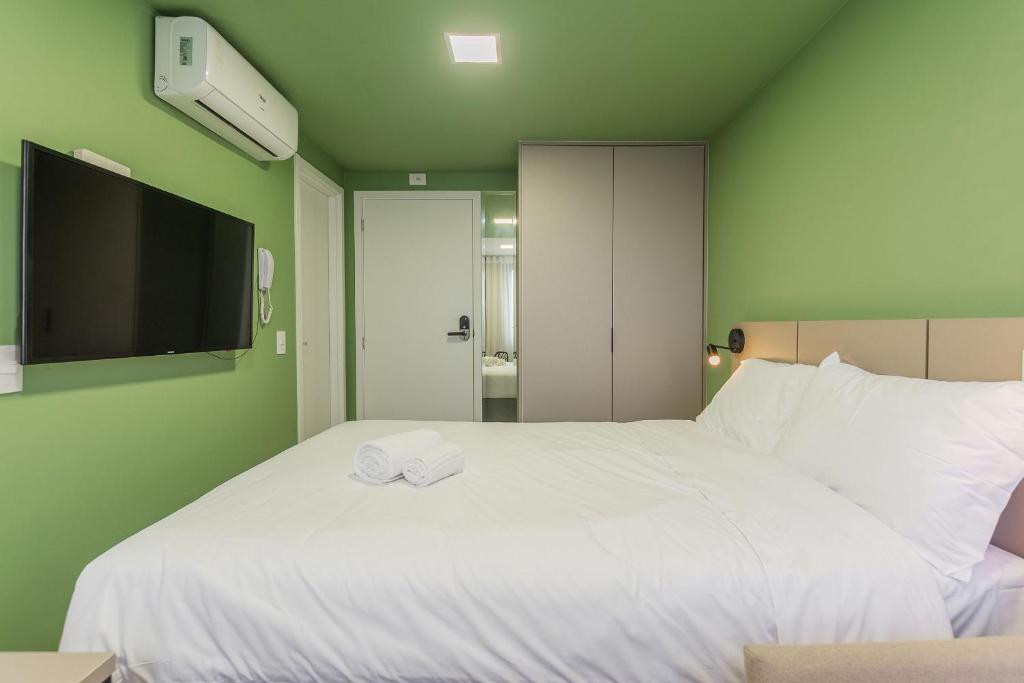 Postel nebo postele na pokoji v ubytování Easy Life Campus PUC by Xtay: Sua moradia em Curitiba
