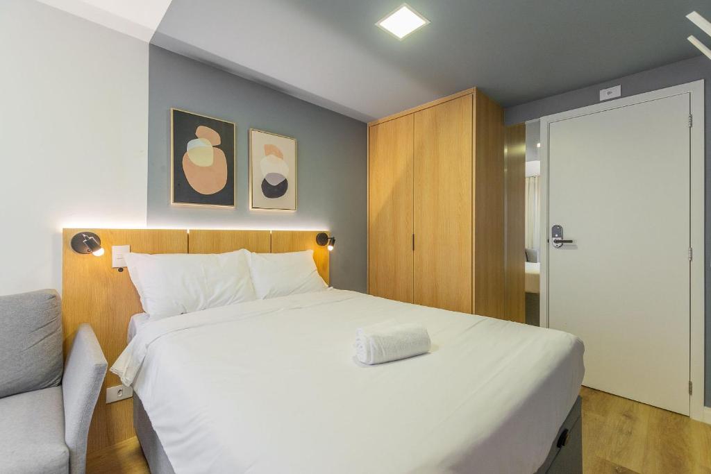 Postel nebo postele na pokoji v ubytování Easy Life Campus PUC by Xtay: Sua moradia em Curitiba