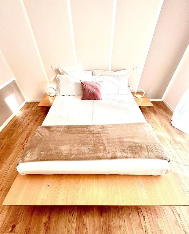 Postel nebo postele na pokoji v ubytování Fiera Maison