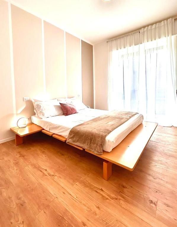 Postel nebo postele na pokoji v ubytování Fiera Maison