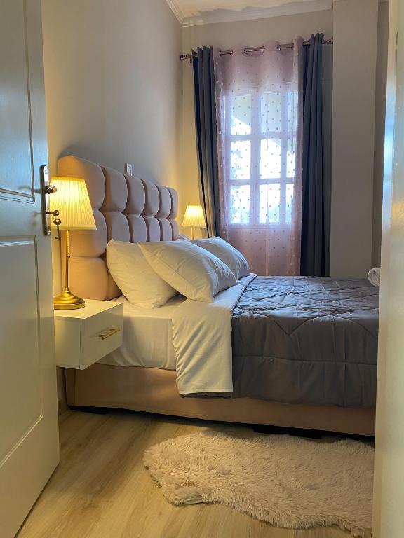 Postel nebo postele na pokoji v ubytování Diamond Suite
