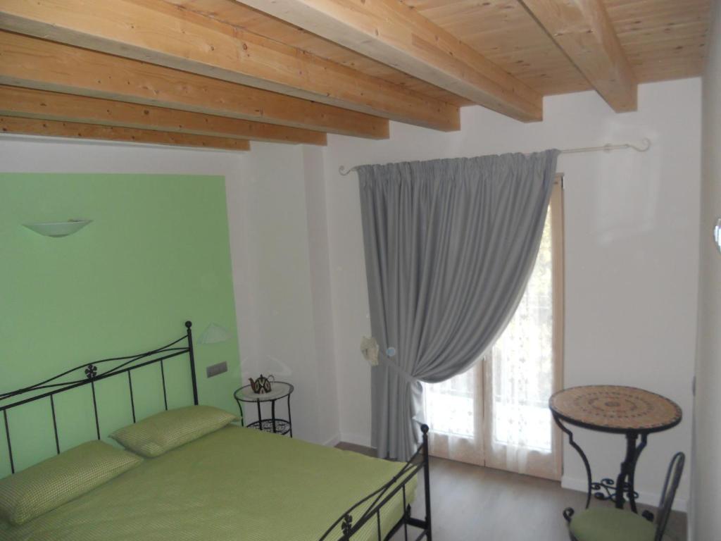 Postel nebo postele na pokoji v ubytování B&B La Teiera