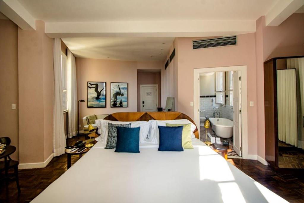 Postel nebo postele na pokoji v ubytování Fera Palace Hotel
