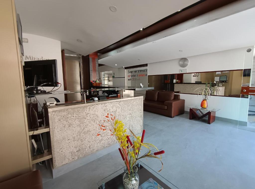 Kuchyň nebo kuchyňský kout v ubytování Aparta-Suites Mirador del Recuerdo