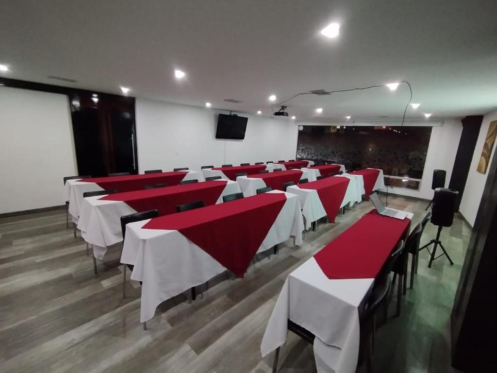 TV a/nebo společenská místnost v ubytování Aparta-Suites Mirador del Recuerdo