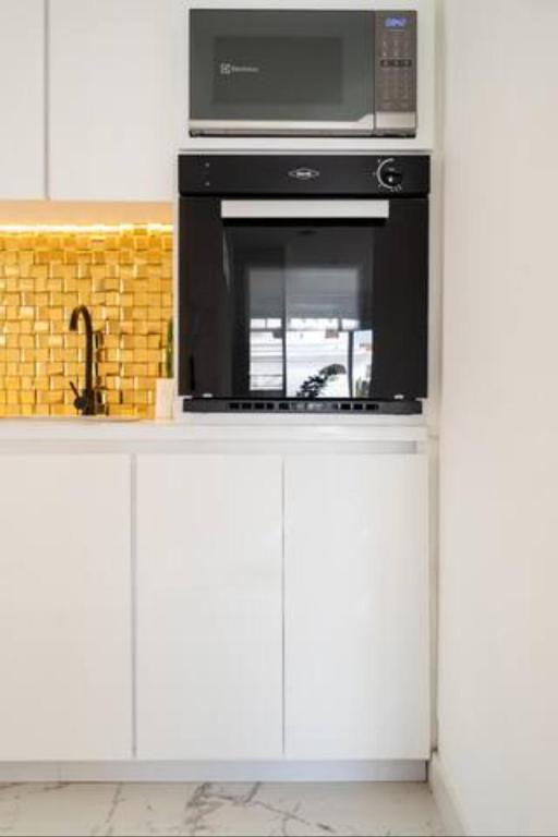 Kuchyň nebo kuchyňský kout v ubytování Casa Verde Hotel