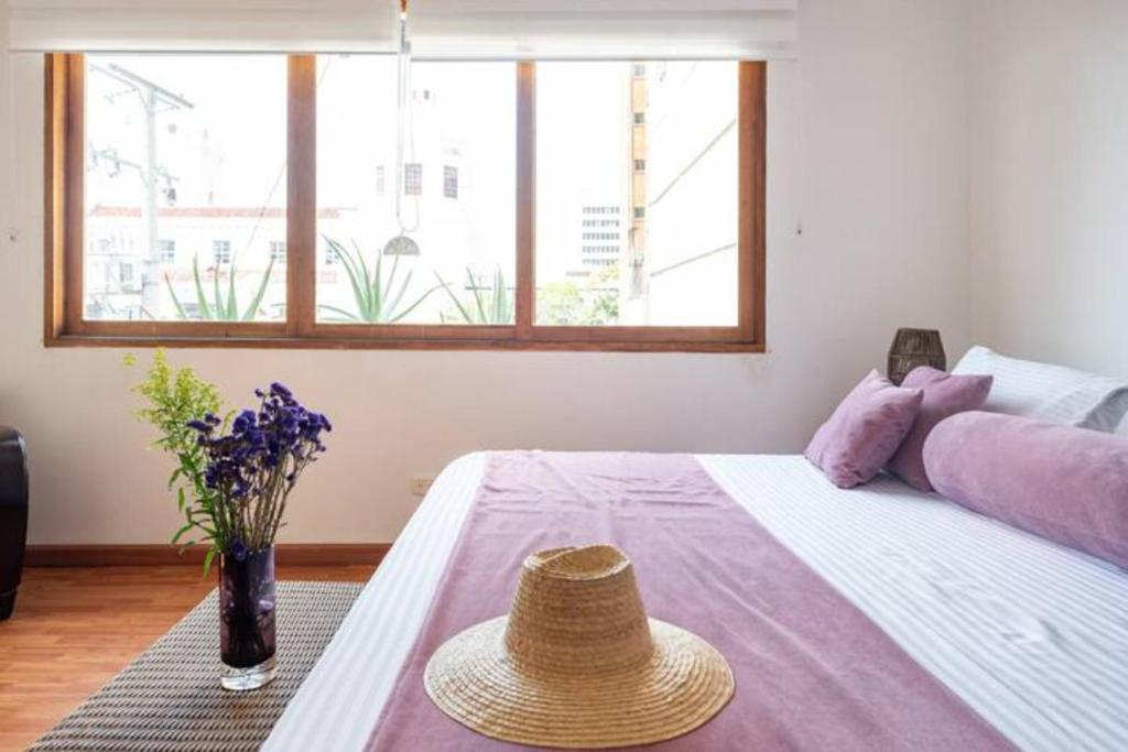 Postel nebo postele na pokoji v ubytování Casa Verde Hotel