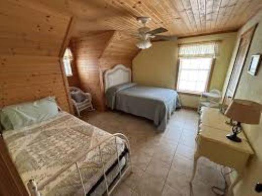 Letto o letti in una camera di Thunderbird Lodge
