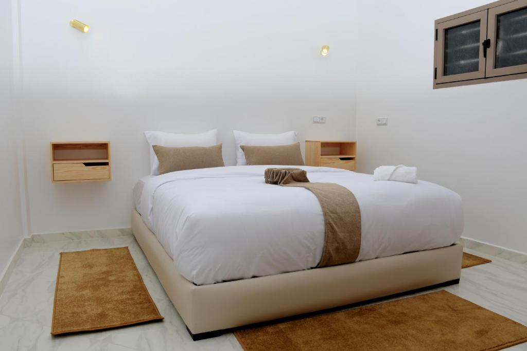 Postel nebo postele na pokoji v ubytování Hotel apartment america
