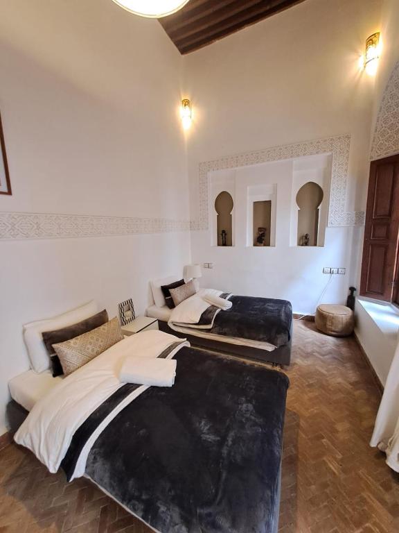 Postel nebo postele na pokoji v ubytování Dar S'BAH