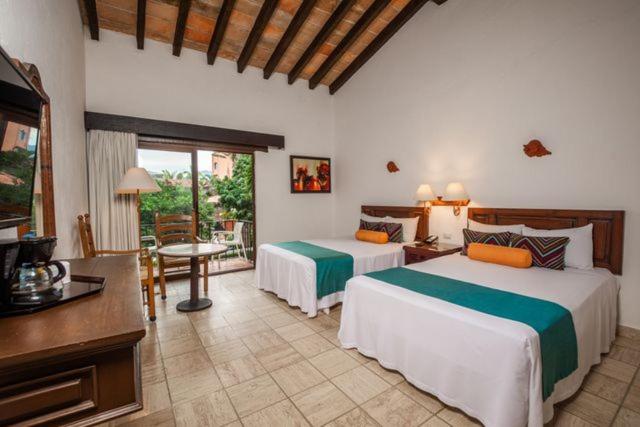 Postel nebo postele na pokoji v ubytování Hacienda Buenaventura Hotel & Mexican Charm - All Inclusive