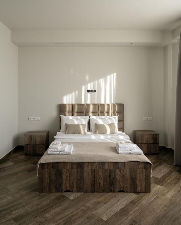 Postel nebo postele na pokoji v ubytování Eclipse Winery Boutique Hotel