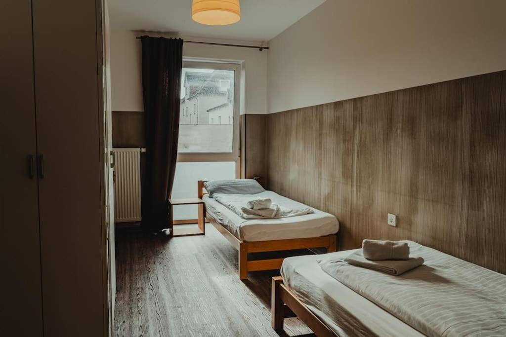 En eller flere senge i et værelse på 3-Zimmer-Oase-Cityapartment Bielefeld Mitte 301