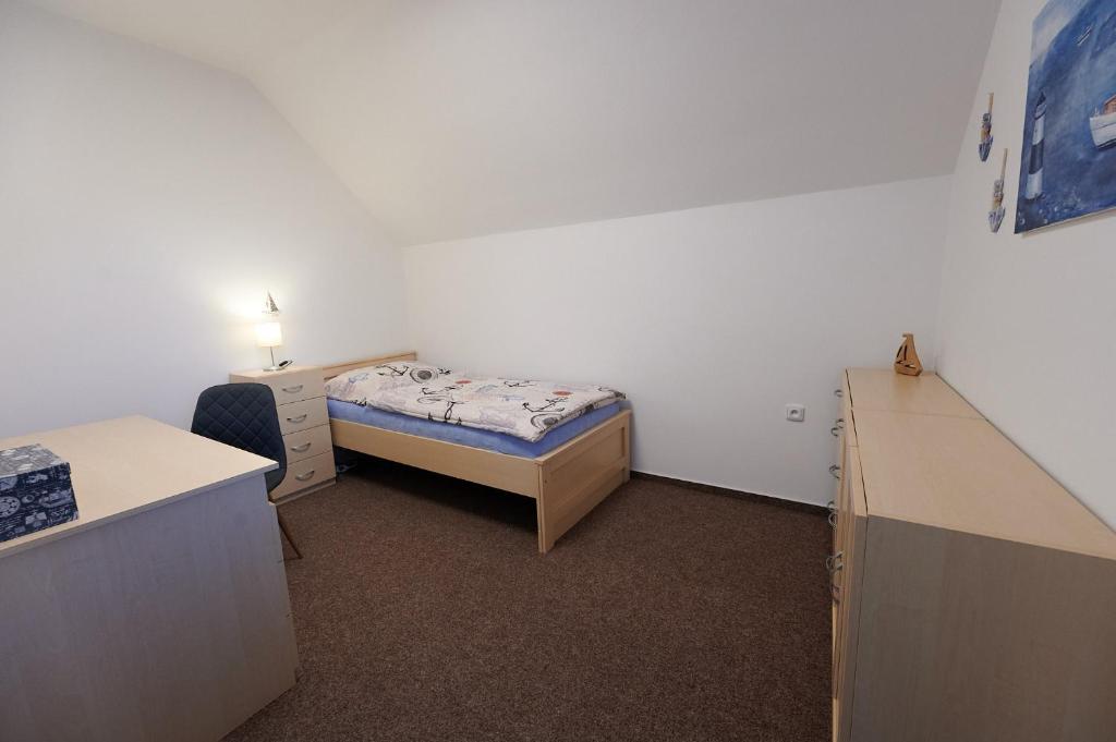 Postel nebo postele na pokoji v ubytování Penzion Počátky Seč