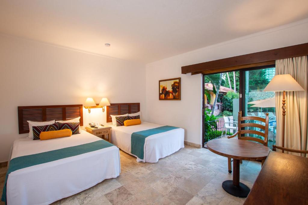 Postel nebo postele na pokoji v ubytování Hacienda Buenaventura Hotel & Mexican Charm - All Inclusive