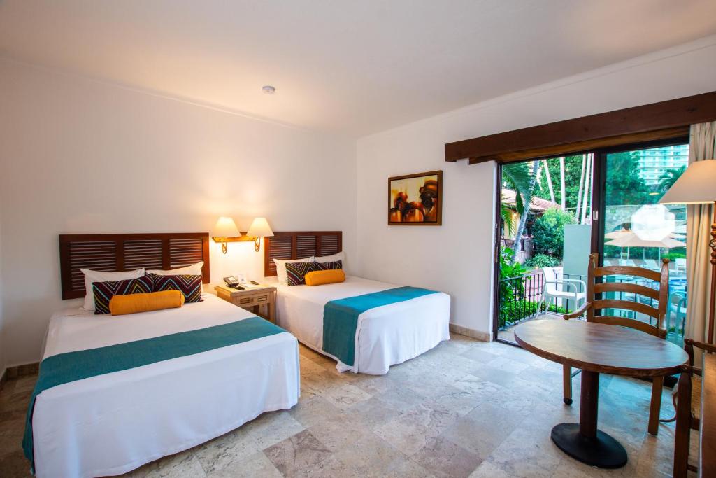 Postel nebo postele na pokoji v ubytování Hacienda Buenaventura Hotel & Mexican Charm - All Inclusive