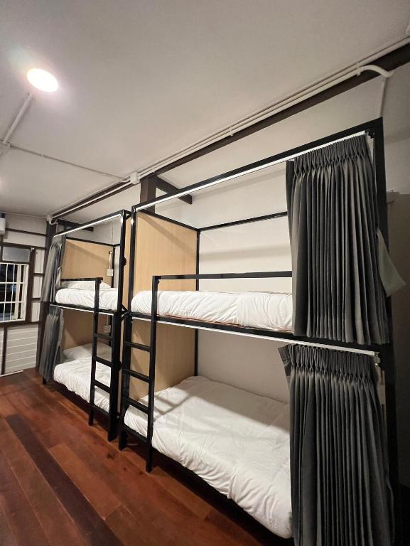 Postel nebo postele na pokoji v ubytování House Ju