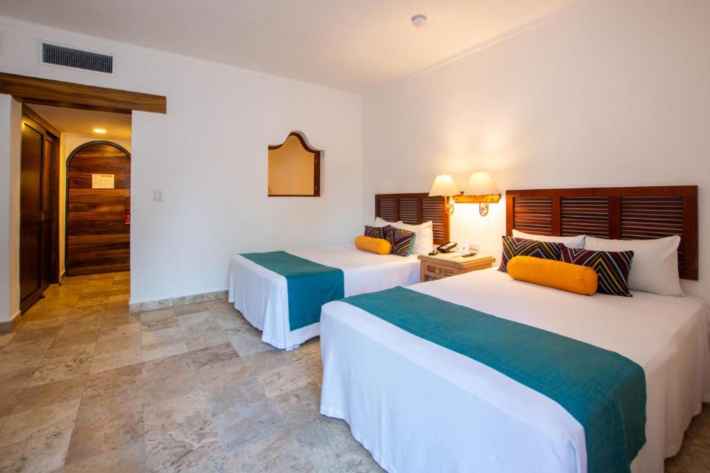 Postel nebo postele na pokoji v ubytování Hacienda Buenaventura Hotel & Mexican Charm - All Inclusive