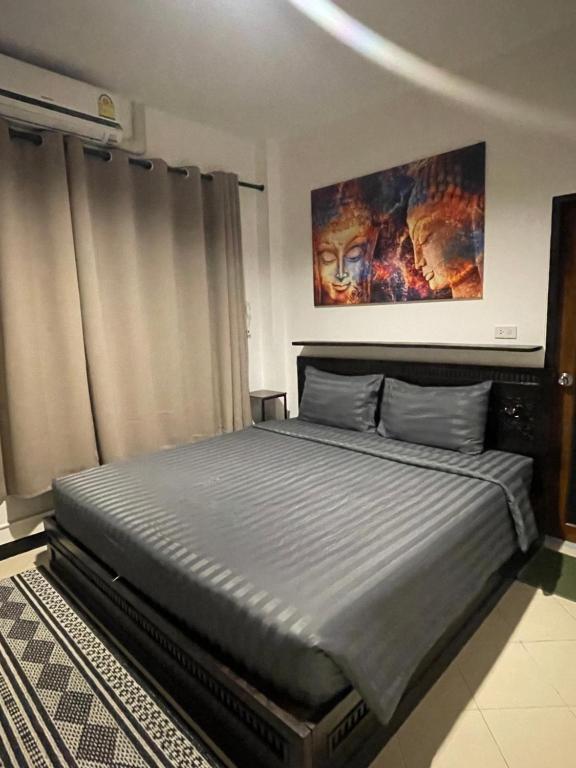 Postel nebo postele na pokoji v ubytování Aisawan Resort villa