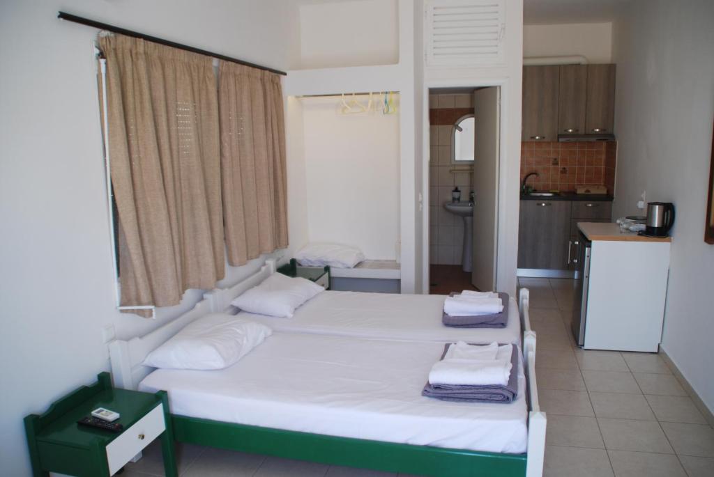 Postel nebo postele na pokoji v ubytování Soula appartments