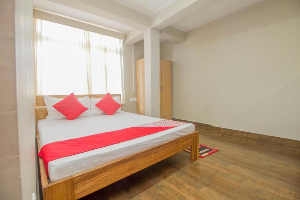 Krevet ili kreveti u jedinici u objektu OYO Hotel Noryang