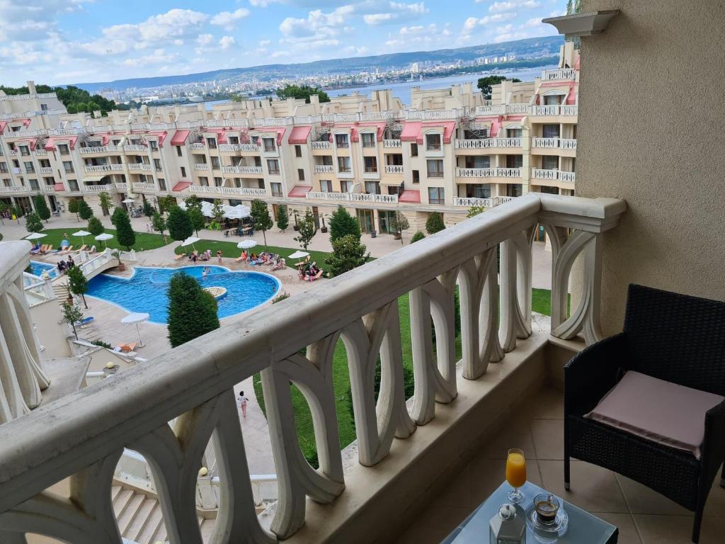 a balcony with a view of a resort at Sunrise Luxury Sauth Bay in Varna City