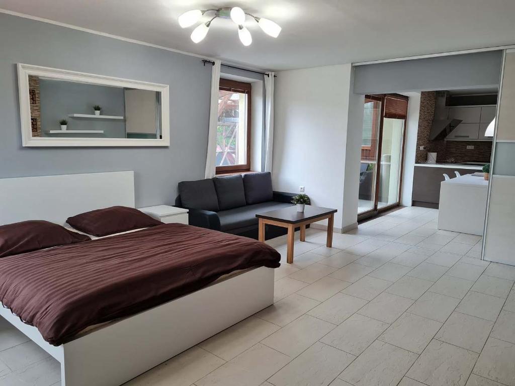 Postel nebo postele na pokoji v ubytování Vila MAX - WHIRLPOOL & BAZÉN & SAUNA