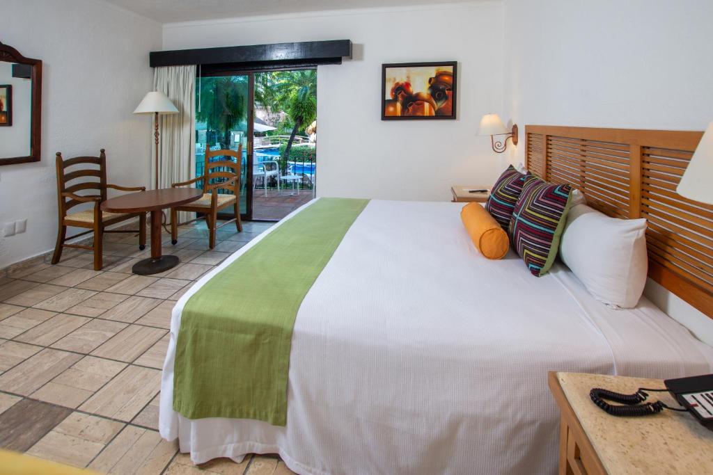 Postel nebo postele na pokoji v ubytování Hacienda Buenaventura Hotel & Mexican Charm - All Inclusive