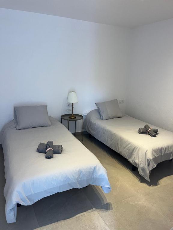 Letto o letti in una camera di Casa Plaza 2