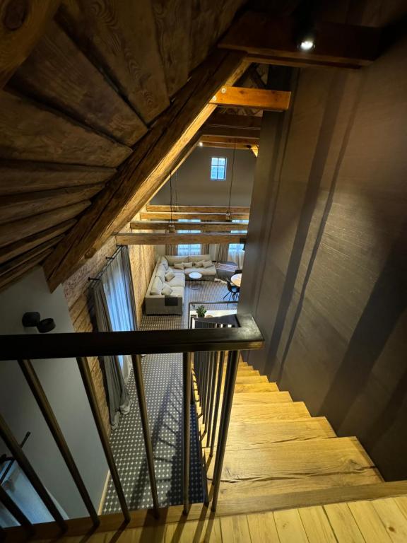 an overhead view of a staircase in a room at Garden House in Liepāja