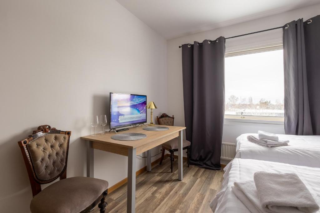 TV a/nebo společenská místnost v ubytování Halmstad Hotel Apartments