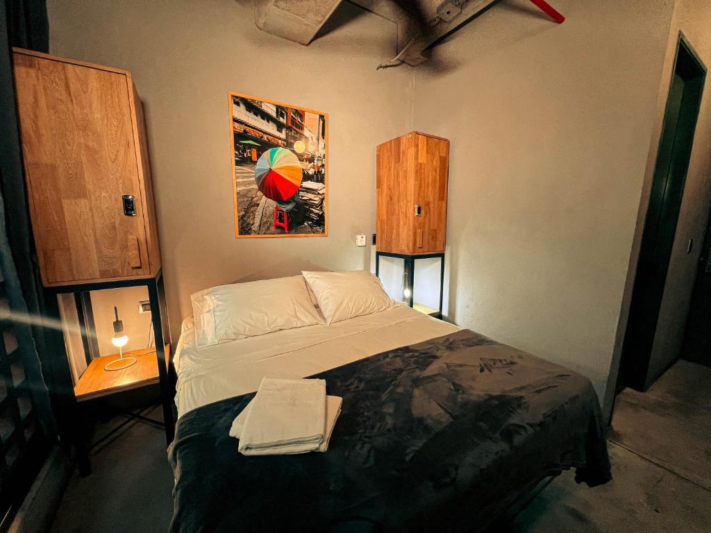 Postel nebo postele na pokoji v ubytování Viajero Medellín Hostel