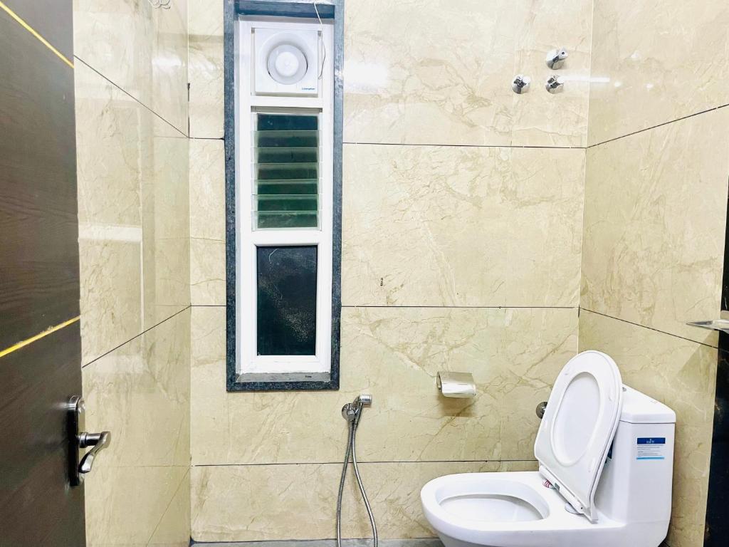 Koupelna v ubytování Deccan Suites, Tirupati