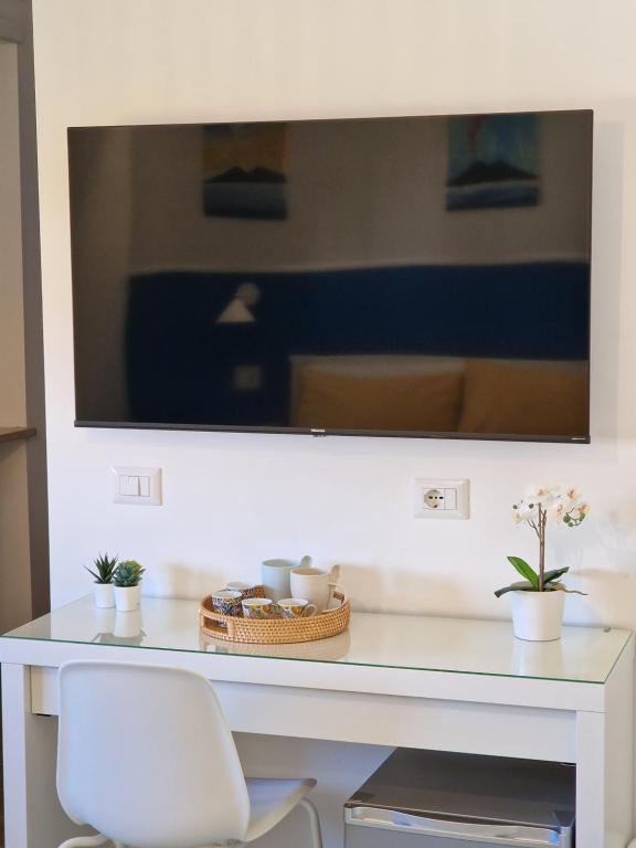 TV a/nebo společenská místnost v ubytování Bellevue Sorrento