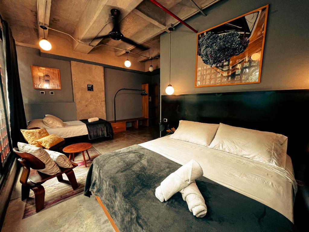 Postel nebo postele na pokoji v ubytování Viajero Medellín Hostel