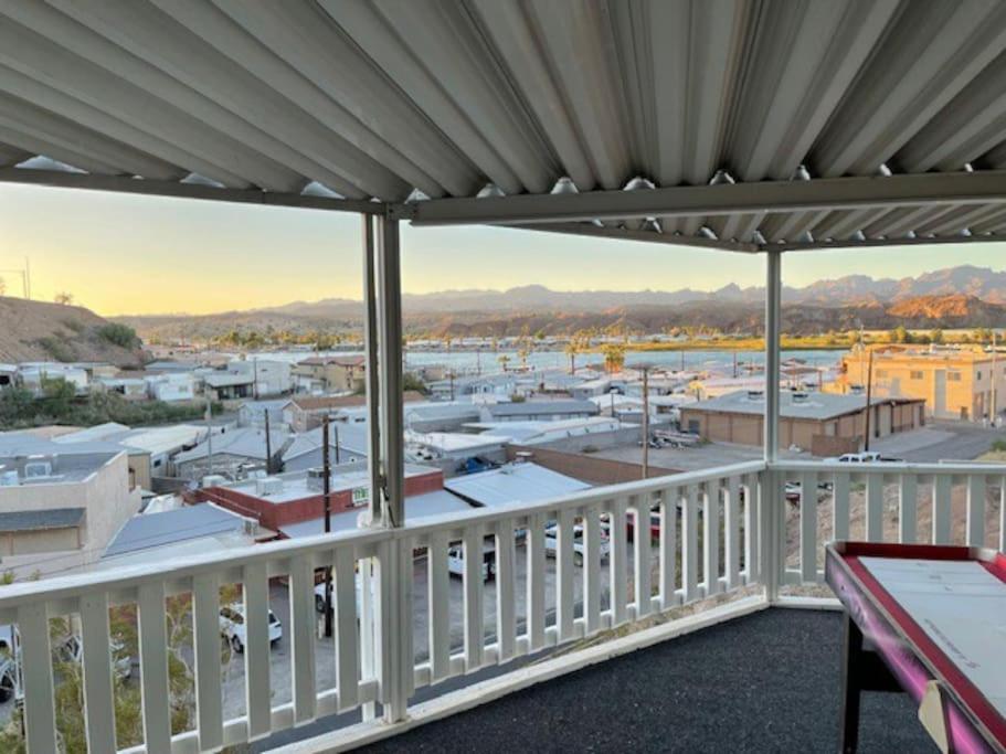 a balcony with a view of a parking lot at Herbster Hideaway in Parker